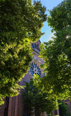 Munich, Germany - July 6, 2022: The Royal Brewery in Munich, the Munich HofbrÃ¤uhaus am Platzl. Must for tourists. The Bavarian flag and the HB logo on the white wall. Beside the Hard Rock Cafeのeditorial素材
