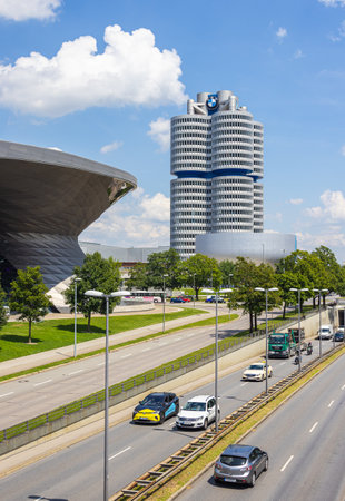 Munich, Germany - July 6, 2022: The headquarters of BMW (Bavarian Motor Works) near the Park. The building represents a four stroke engine. Next to it is the BMW Museum, which is worth seeingのeditorial素材