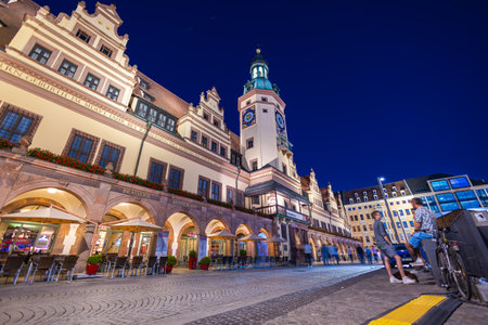 Leipzig, Germany - July 02, 2022: New Town hall at the Leipzig marketplace or market square. Illuminated on a warm summer night. The New Town Hall at the market in the center of the saxony city.のeditorial素材