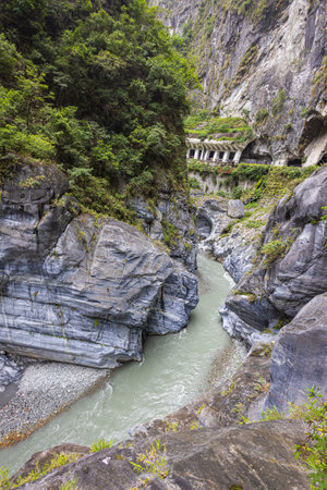 The Nine Turns Trail in Taiwan is a mesmerizing symphony of nature, where lush forests, cascading waterfalls, and towering cliffs create a breathtaking experience. Taiwan's nature and landscapeの写真素材