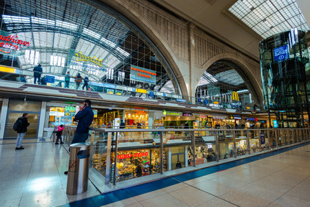 Leipzig, Germany - February 20, 2023: Leipzig main railway station. Train station or Hauptbahnhof of the Deutsche Bahn. Train hall with shops on two floors. Europe's largest terminal stationのeditorial素材
