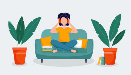 Girl in headphones sitiing on sofa. Vector illustration.のイラスト素材
