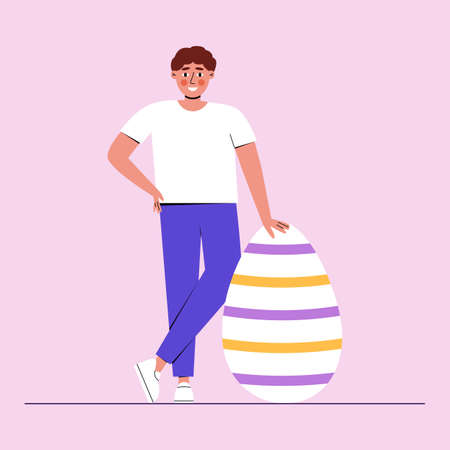 Man stands near large Easter eggのイラスト素材