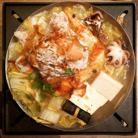 Mixed seafood and pork boiling hot pot.の写真素材