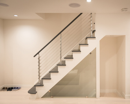 Modern staircase and hand rail design in white and grey colorの写真素材