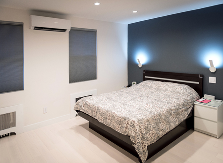 Modern bedroom well designed with modern electronics and furnitures.の写真素材