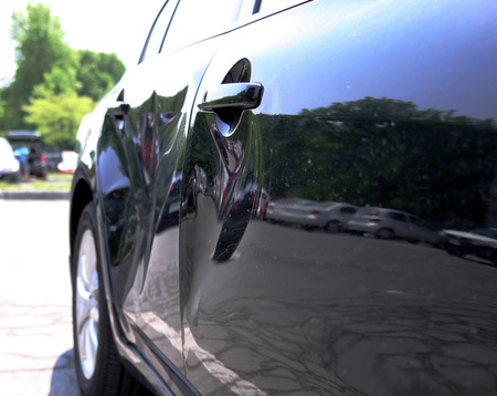 Car body and doors damaged in a collisionの写真素材