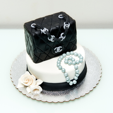 Homemade classic Chanel handbag in black fountain birthday cake.のeditorial素材