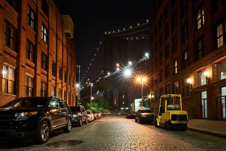 Iconic view of the Manhattan bridge from Dumbo, Brooklyn, New York City, USAの写真素材