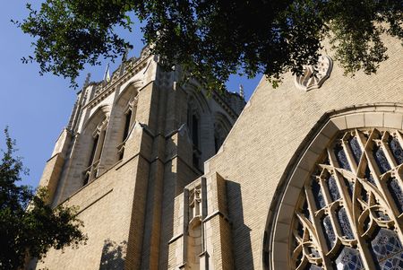 An ornate church against a bright blue sky.の写真素材