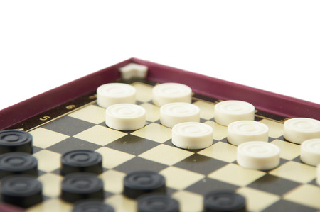 It is black white checkers on a game floor.