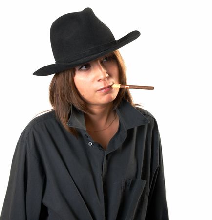 The girl in a black shirt and a cowboy's hat の写真素材