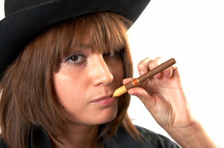 The girl in a black shirt and a cowboy's hat の写真素材