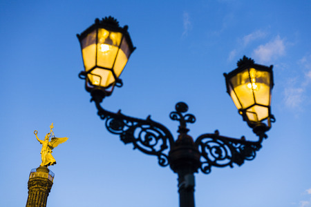 Historic street light in front of Siegessaeule Victory Column, Berlin, Germanyの写真素材