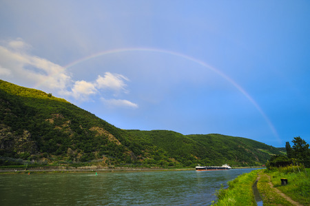 Rainbow over the Rhine at Trechtingshausen, Rhineland-Palatinate, Germanyのeditorial素材