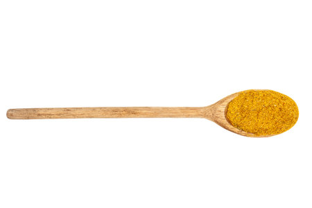 Round wooden spoon on white background filled with ground cumin. Isolated image ideal for recipes, cooking, spices, or food advertisingの写真素材