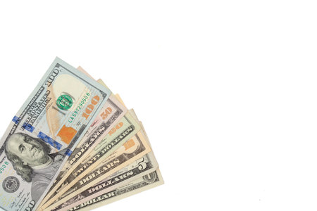 Visual concept of money and finance with fanned-out US dollar bills. Clean white background, perfect...