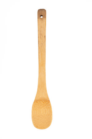 Eco bamboo cooking spoon isolated on white background. Sustainable kitchen utensil made from natural materials, ideal for healthy food and organic lifestyle conceptsの写真素材