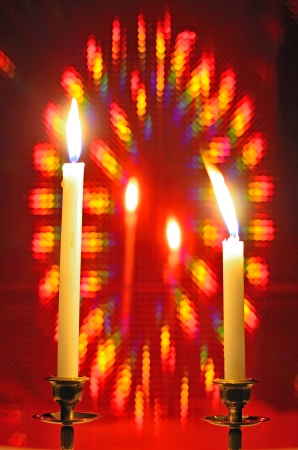 red bokeh background with candleの写真素材