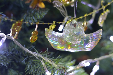 silver wing hang on the christmas treeの写真素材
