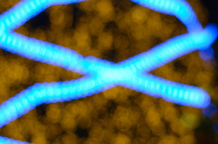 horizontal glitter gold and blue line bokeh backgroundの写真素材