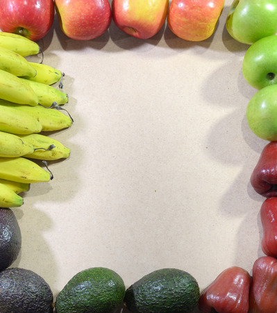 different fruits frame on the wooden boardの写真素材