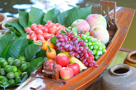 fake fruits on thai  boatの写真素材