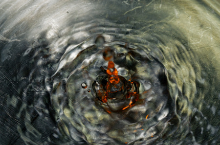 water drop on metallic backgroundの写真素材