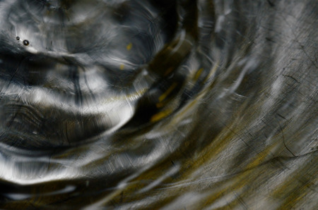 water ripples on metallic backgroundの写真素材