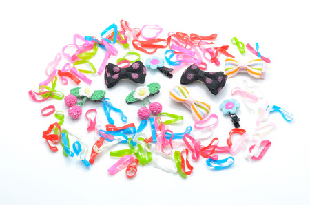 variety barrette and elastic band on white background