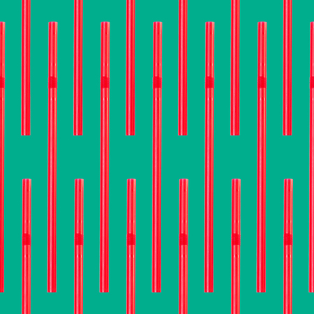 the vertical red straws seamless pattern on greenの写真素材