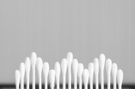 Close up cotton buds arranged in wave.