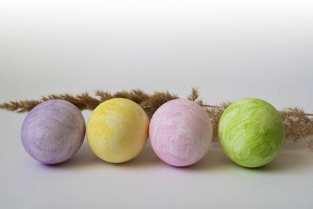colored easter eggs on a white background