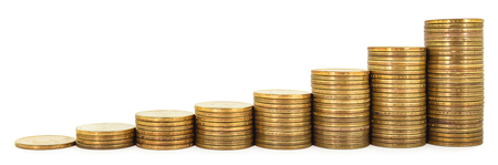 Stack of one dollar coins arranged as a graph isolated on white background, concept of economic and business growthの写真素材