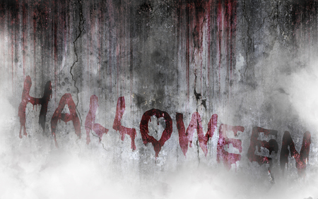 Write a Halloween message on bloody background scary old wall and smoke, concept of Halloween and horror crimeの写真素材