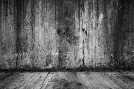 Old empty grunge room with concrete wall, black and white interior backgroundの写真素材