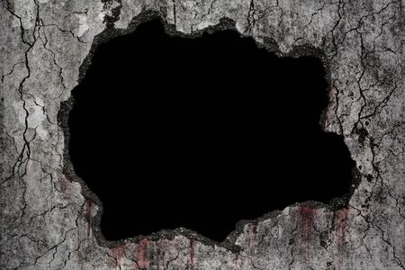 Bloody background scary on damaged grungy crack and broken concrete wall, concept of horror and Halloweenの写真素材