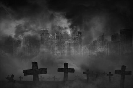 Scary background cemetery cross and abandoned large cities are covered with smoke from the civil war, concept of horror and warの写真素材