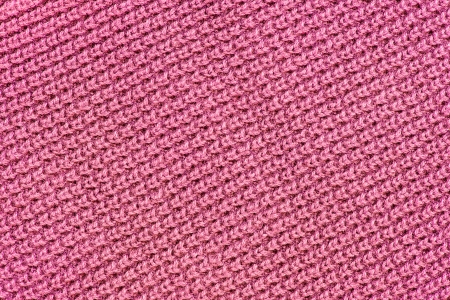 Pink wool knitted textured backgroundの写真素材
