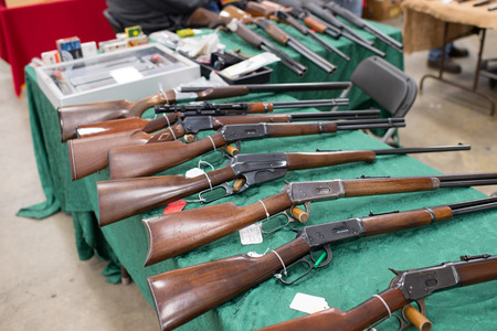 Winneconne, WI - 17 April 2016:  Image of rifles on a table at a gun show.のeditorial素材