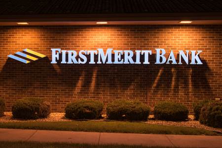 Oshkosh, WI - 5 June 2016: Firstmerit bank sign illuminated at night.  Bemisのeditorial素材