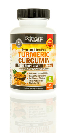 Winneconne, WI - 12 February 2017: Bottle of Schwartz turmeric curcumin capsules on an isolated background.のeditorial素材