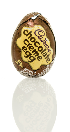 Winneconne, WI - 16 April 2017: A single shot of a Cadbury chocolate creme egg on an isolated background.のeditorial素材
