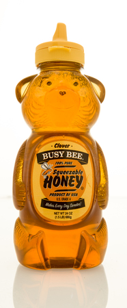 Winneconne, WI - 16 May 2017: A bottle of Clover Busy Bee honey on an isolated background.のeditorial素材