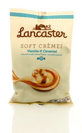 Winneconne, WI - 30 August 2017:  A bag of Lancaster soft cremes candy in vanilla and caramel on an isolated background.のeditorial素材