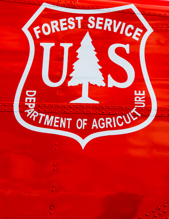 Oshkosh, WI - 24 July 2017: A US Forest Service Department of Agriculture sign on side of an airplane.のeditorial素材