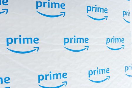 Winneconne, WI -6 March 2018: A close up of an Amazon Prime plastic envelope used to protect products it sells on an isolated background.のeditorial素材