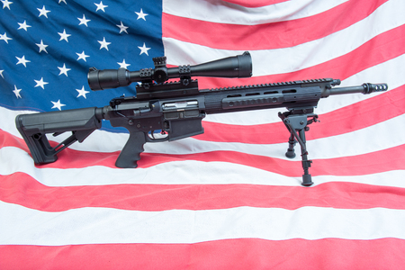An AR-15 on an American flagの写真素材