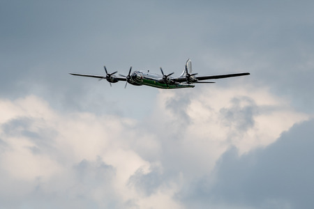 Oshkosh, WI - 28 July 2018:  A B-29 Superfortress bomber flying around, demostrating power from over 60 years ago.のeditorial素材