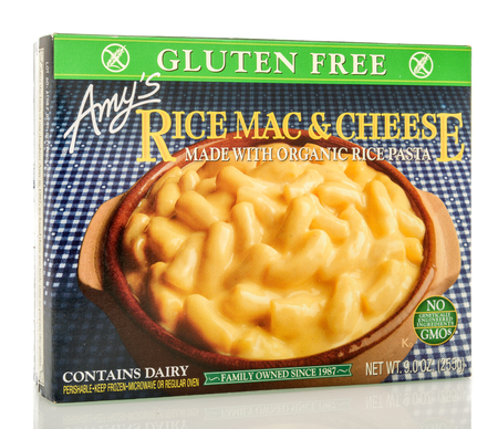 Winneconne, WI - 12 September 2018: A box of Amy's Rice mac and cheese made with organic rice pasta on an isolated backgroundのeditorial素材